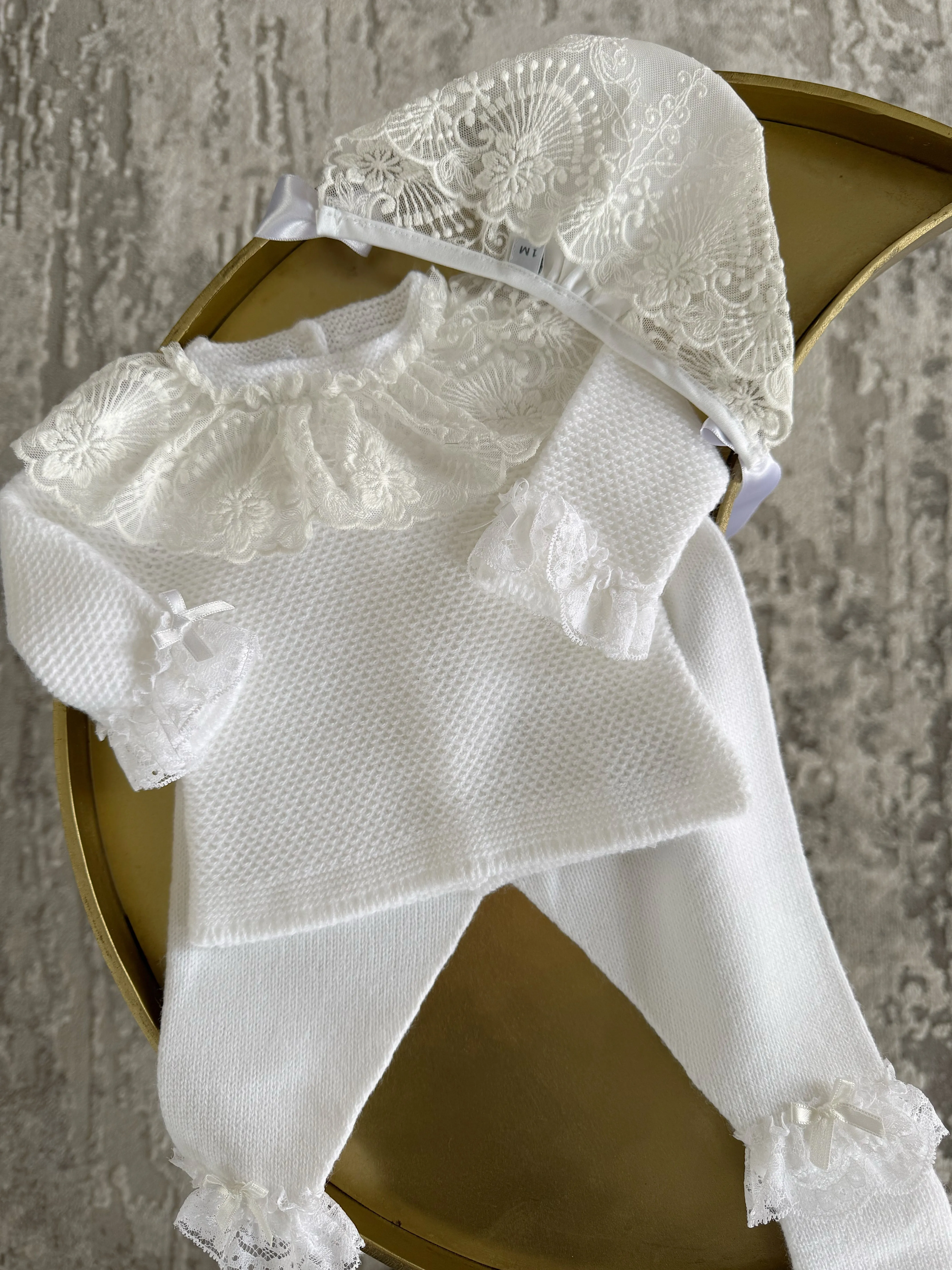 Beautiful White knitted 3 piece set with wide lace and bow details.