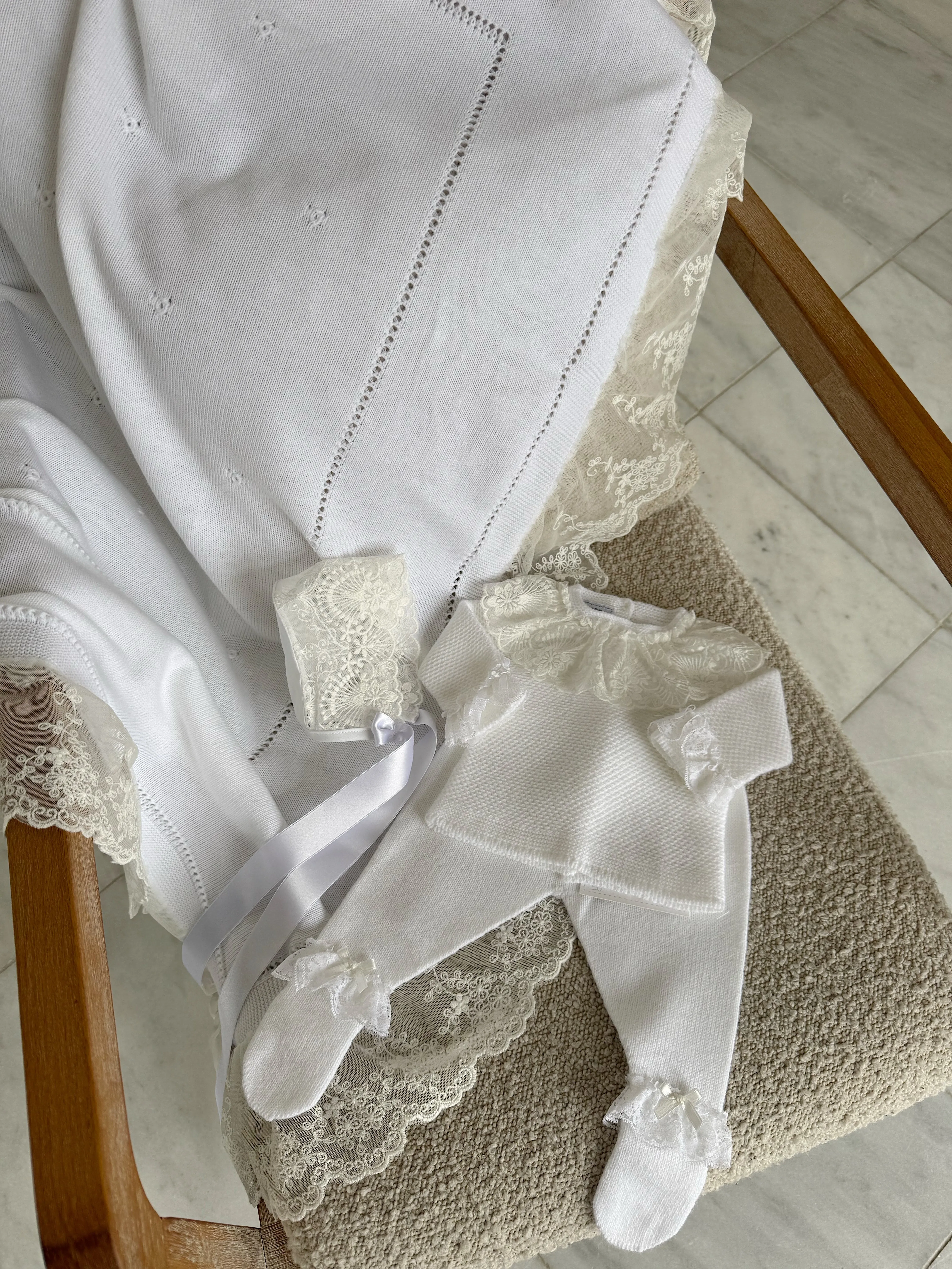 Beautiful White knitted 3 piece set with wide lace and bow details.