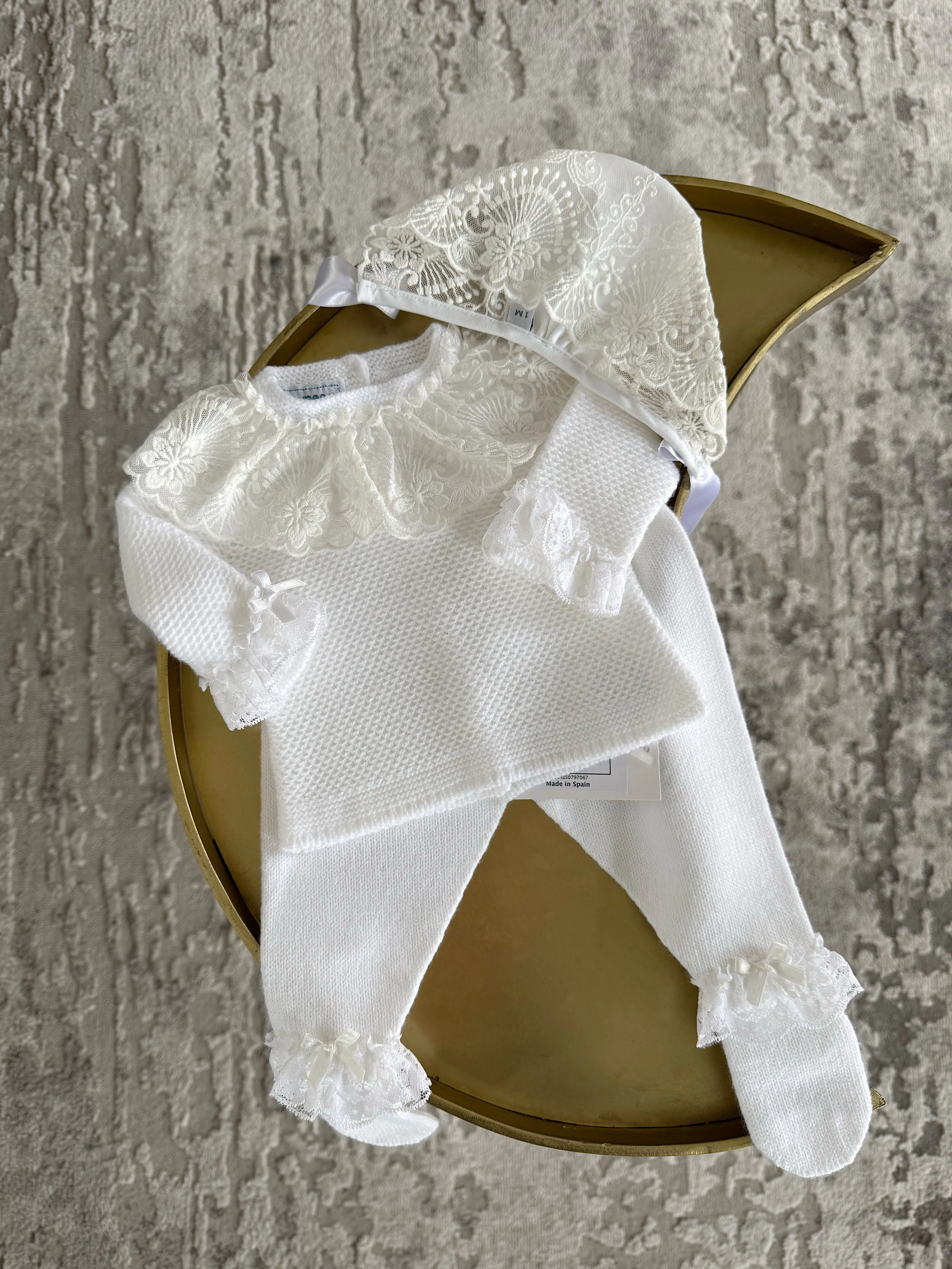 Beautiful White knitted 3 piece set with wide lace and bow details.