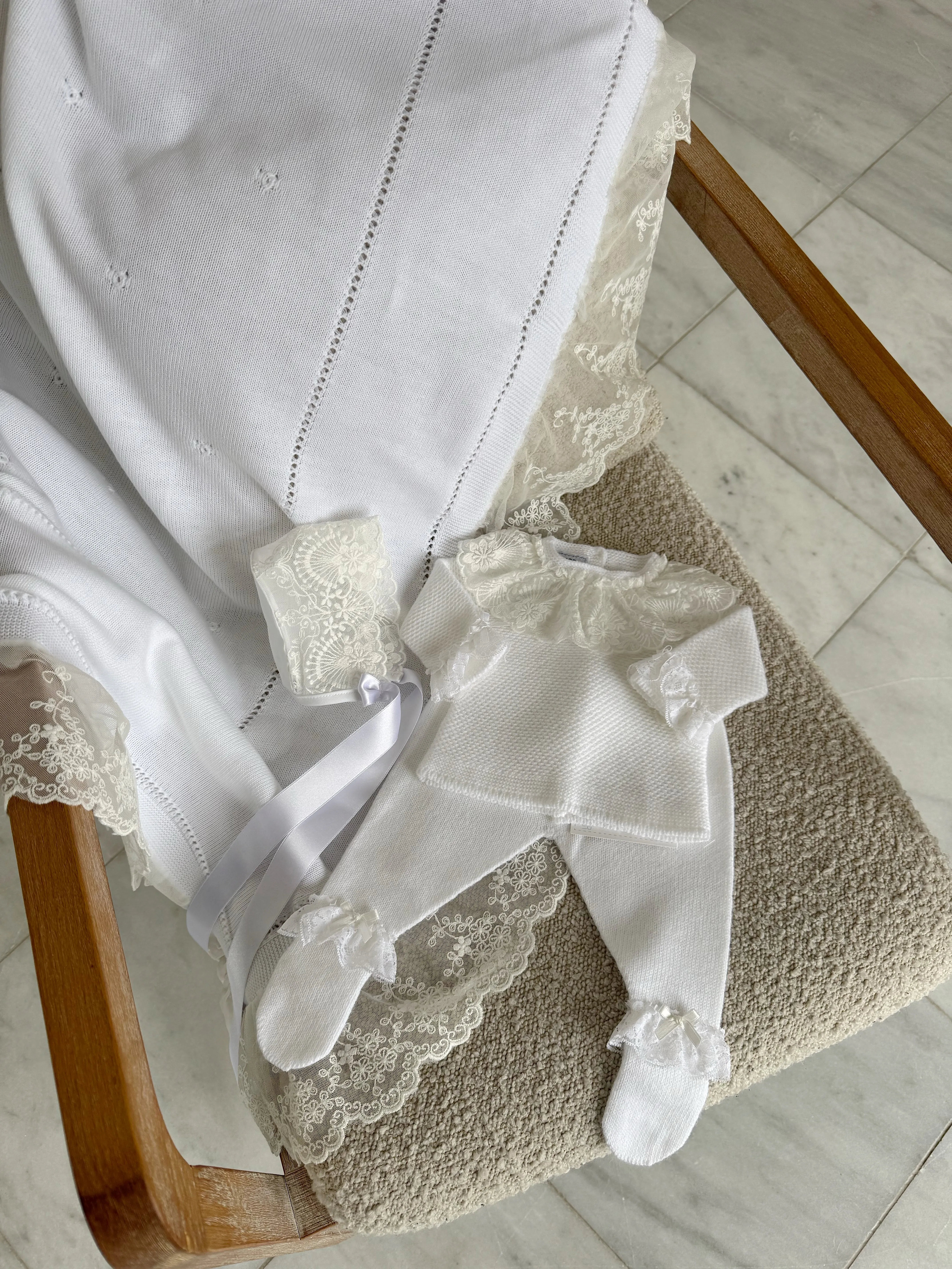 Beautiful White knitted 3 piece set with wide lace and bow details.