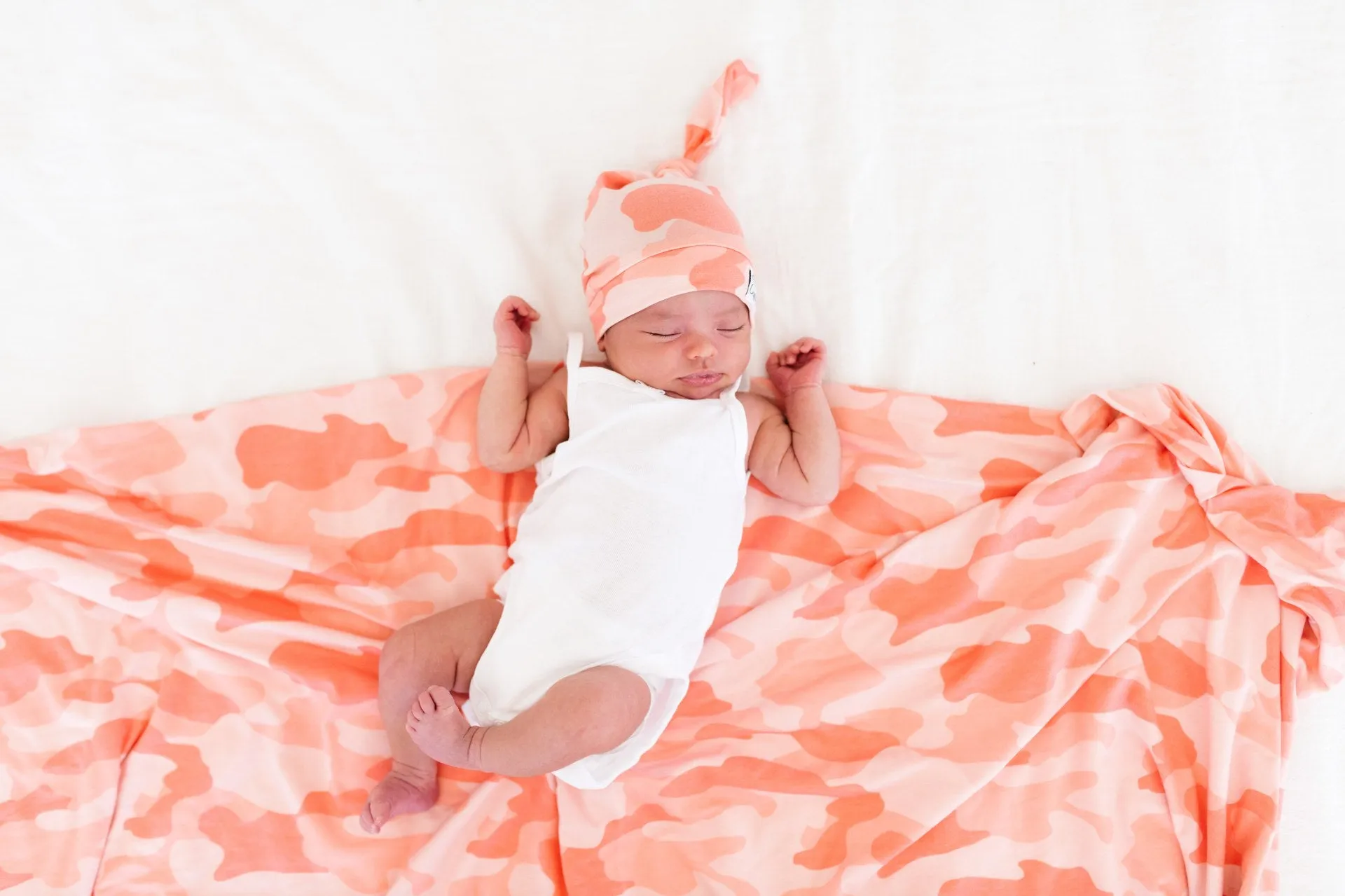 Copper Pearl Remi Top Knot Hat