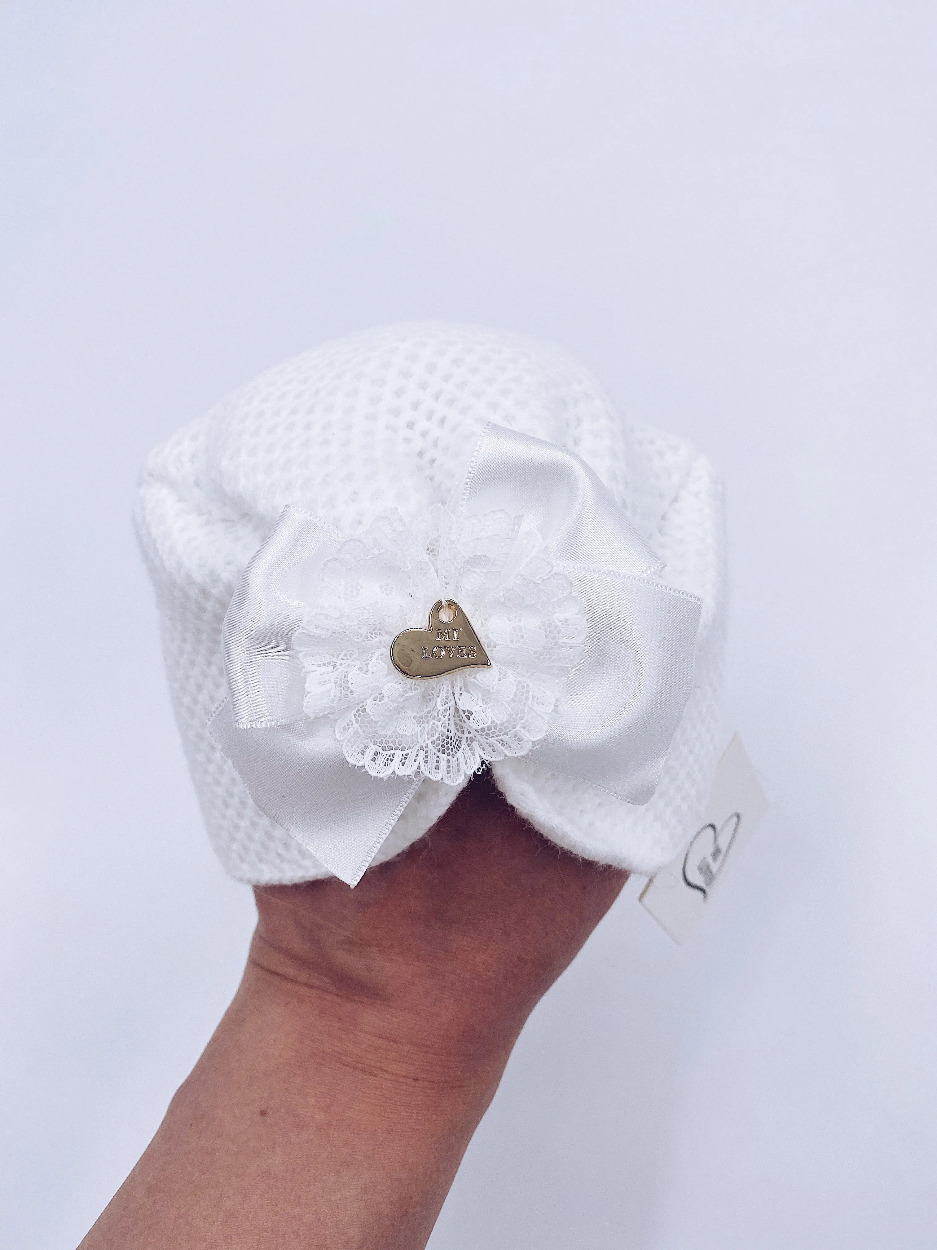 MI LOVEE SIGNATURE Luxurious knitted Turban hat with lace detail.