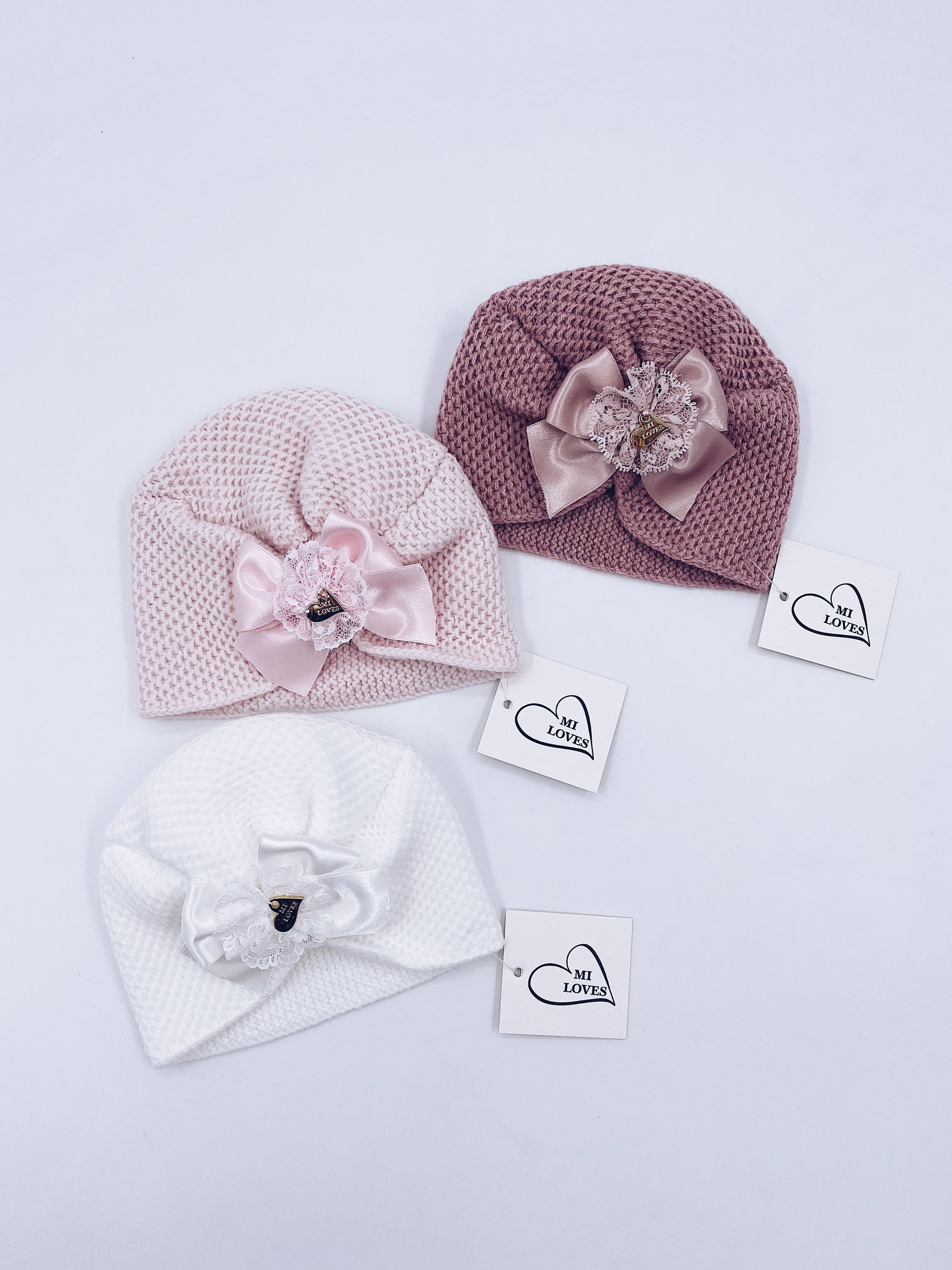 MI LOVEE SIGNATURE Luxurious knitted Turban hat with lace detail.