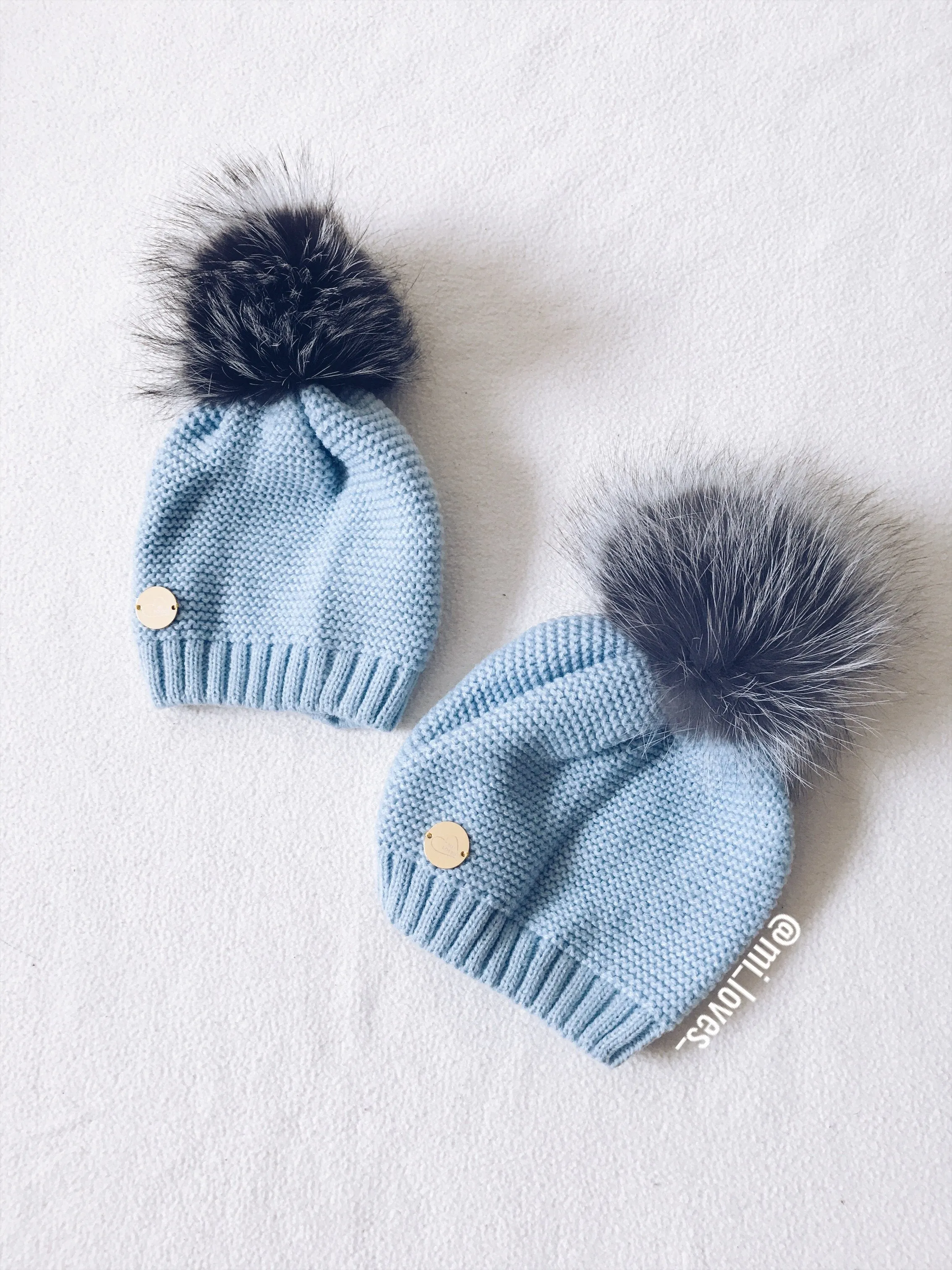 MILOVES Signature Single Pompom hat with Silver fur pompom.