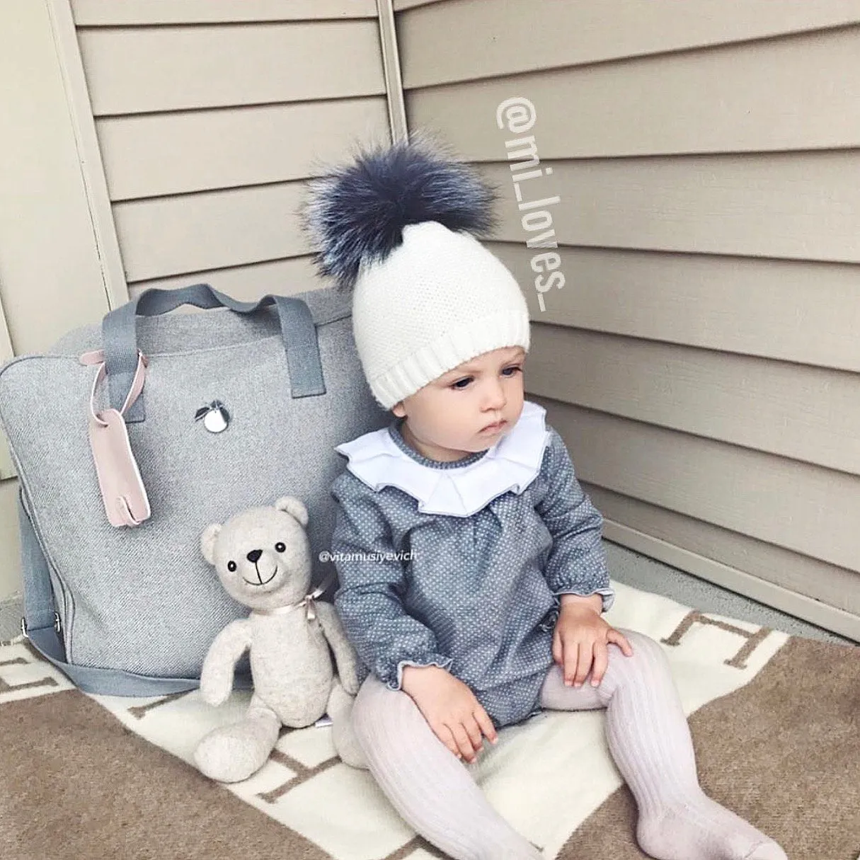 MILOVES Signature Single Pompom hat with Silver fur pompom.