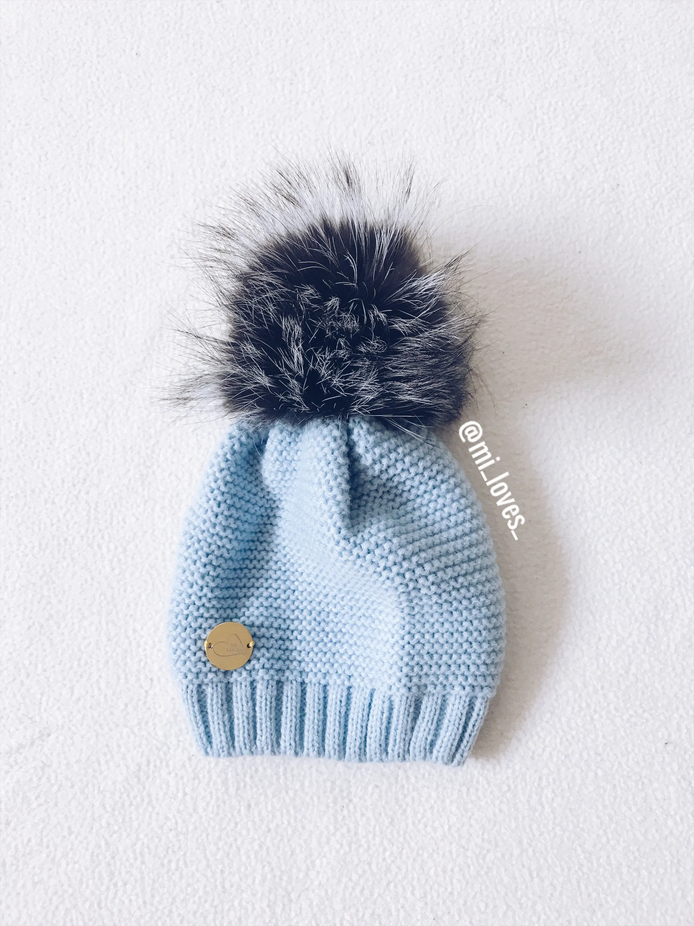 MILOVES Signature Single Pompom hat with Silver fur pompom.