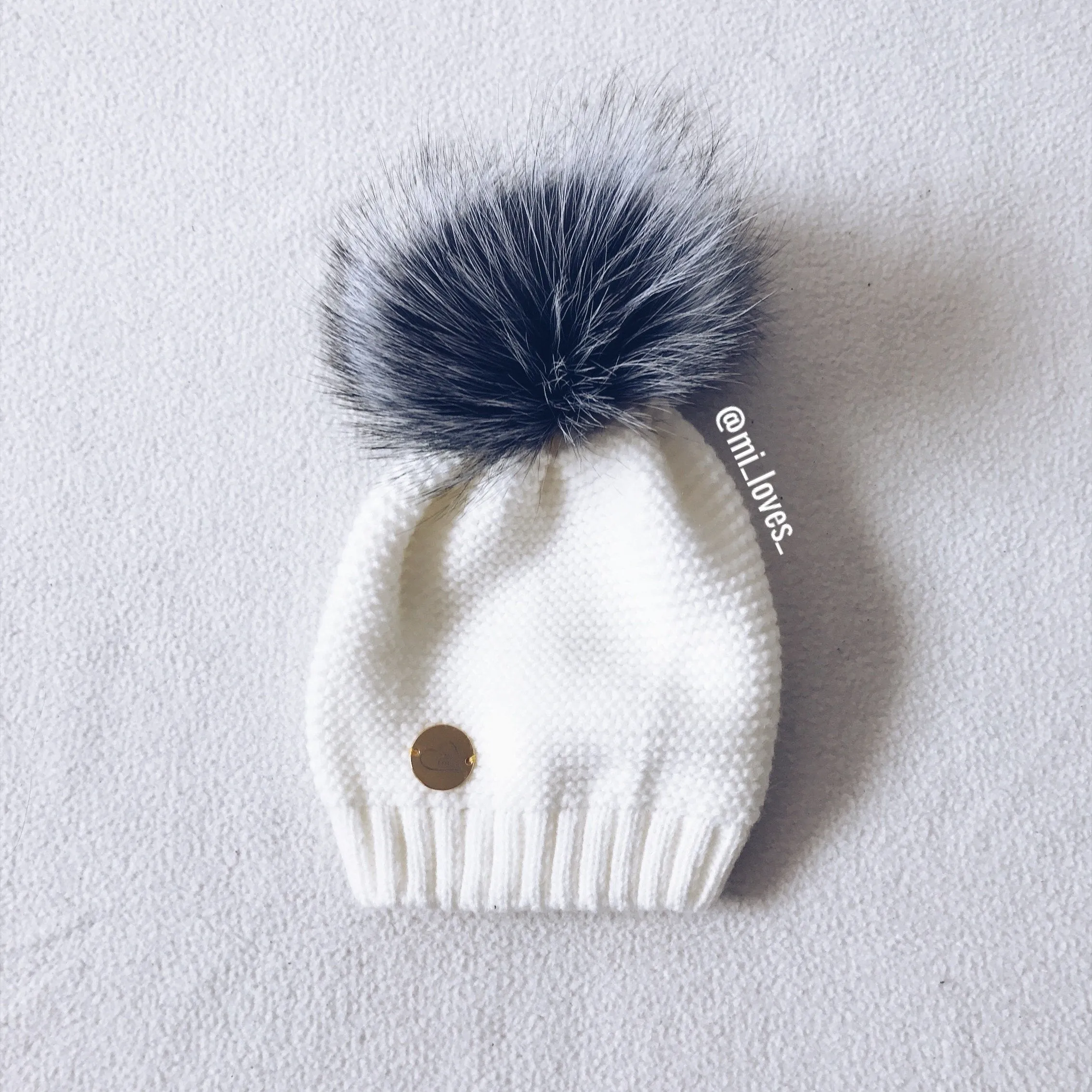 MILOVES Signature Single Pompom hat with Silver fur pompom.
